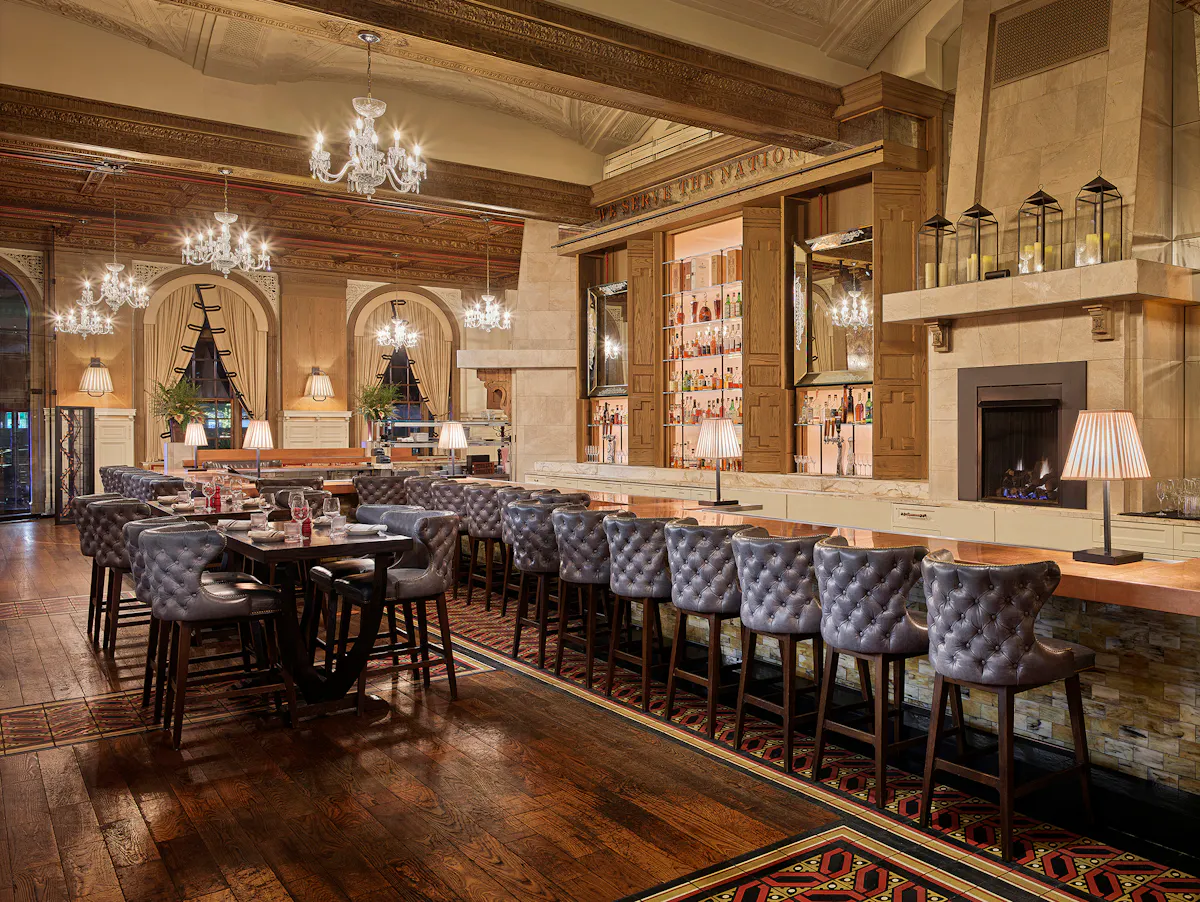 The long bar and dining room at OAK Long Bar + Kitchen