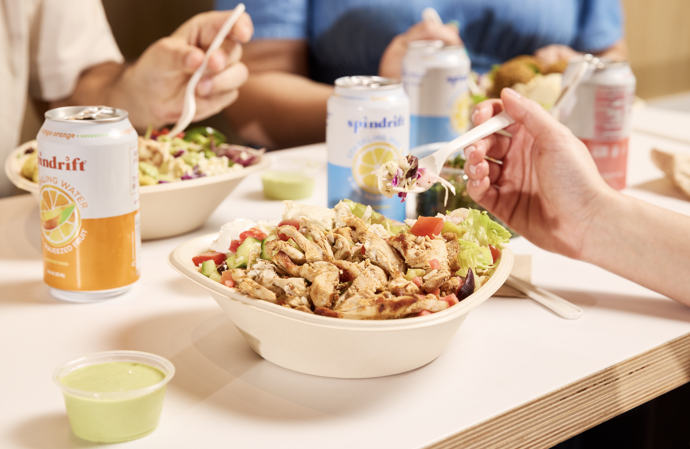 a group of people eating food