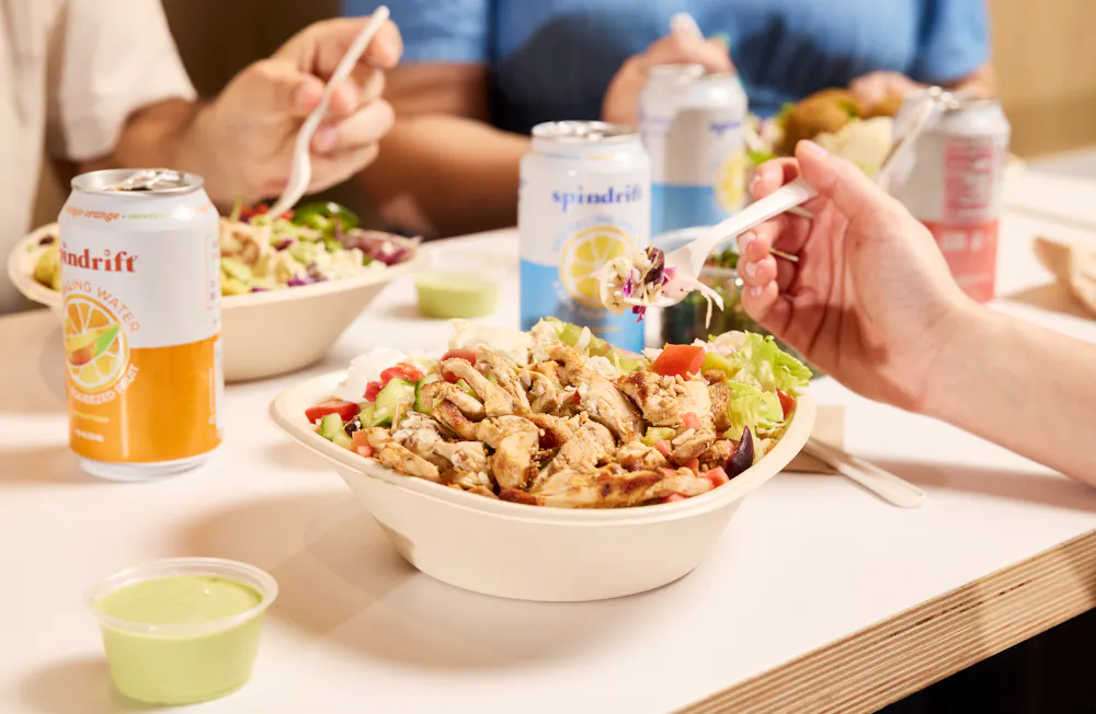 a group of people eating food