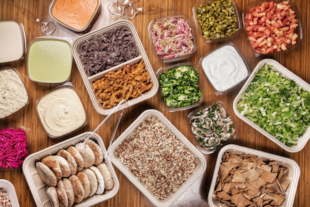 a box filled with different types of food on a table