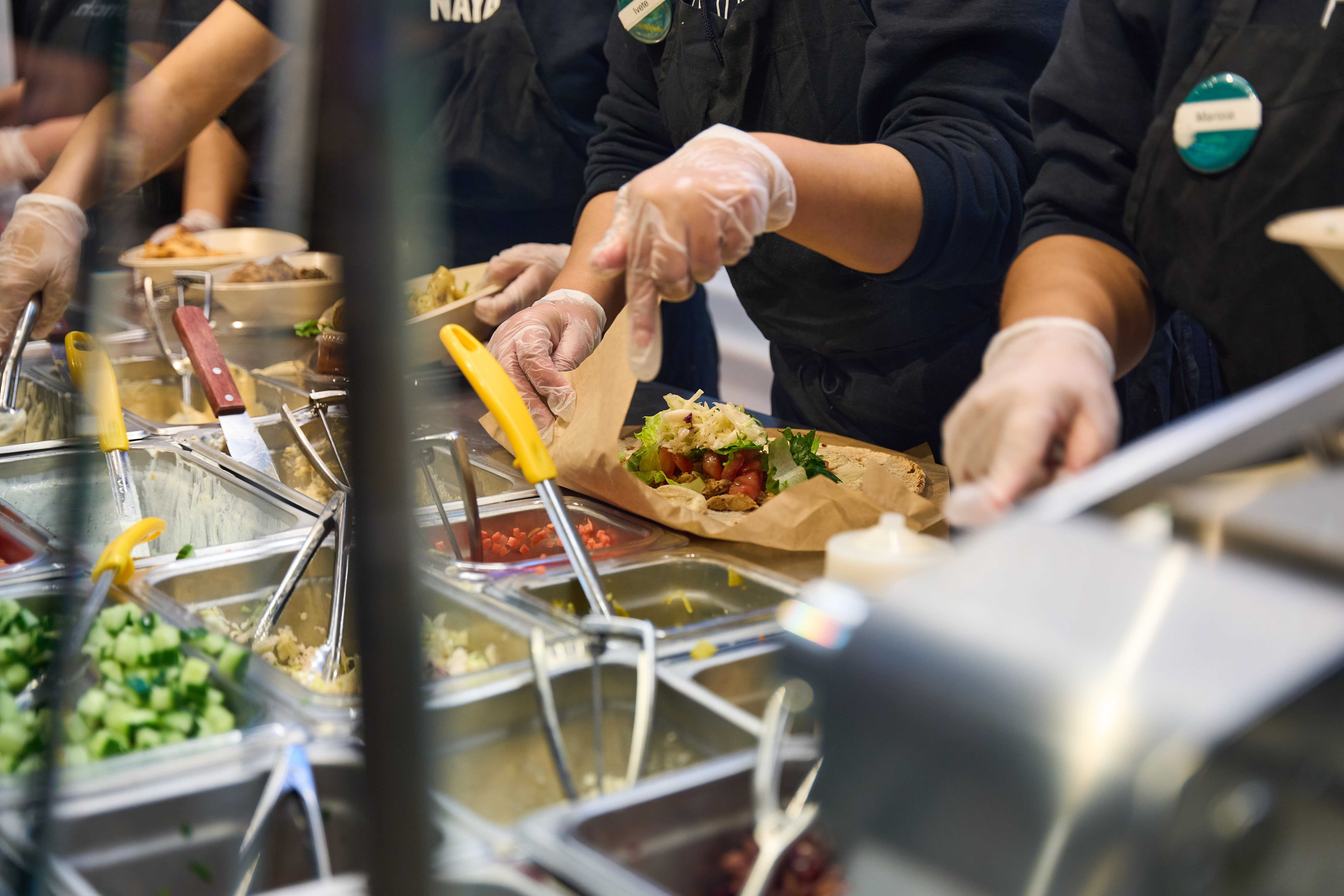 a man cutting food on a table