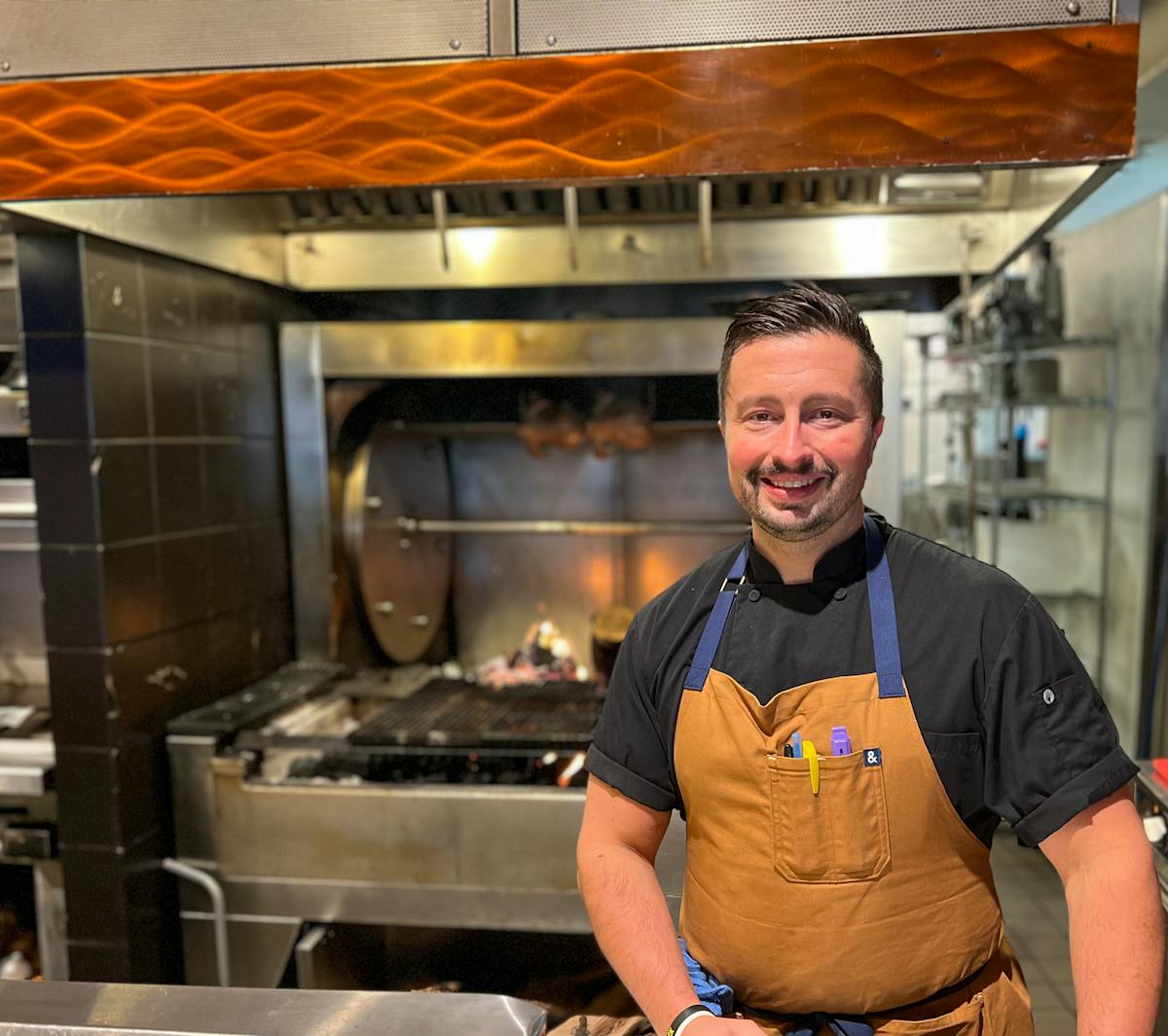 a man cooking in a kitchen