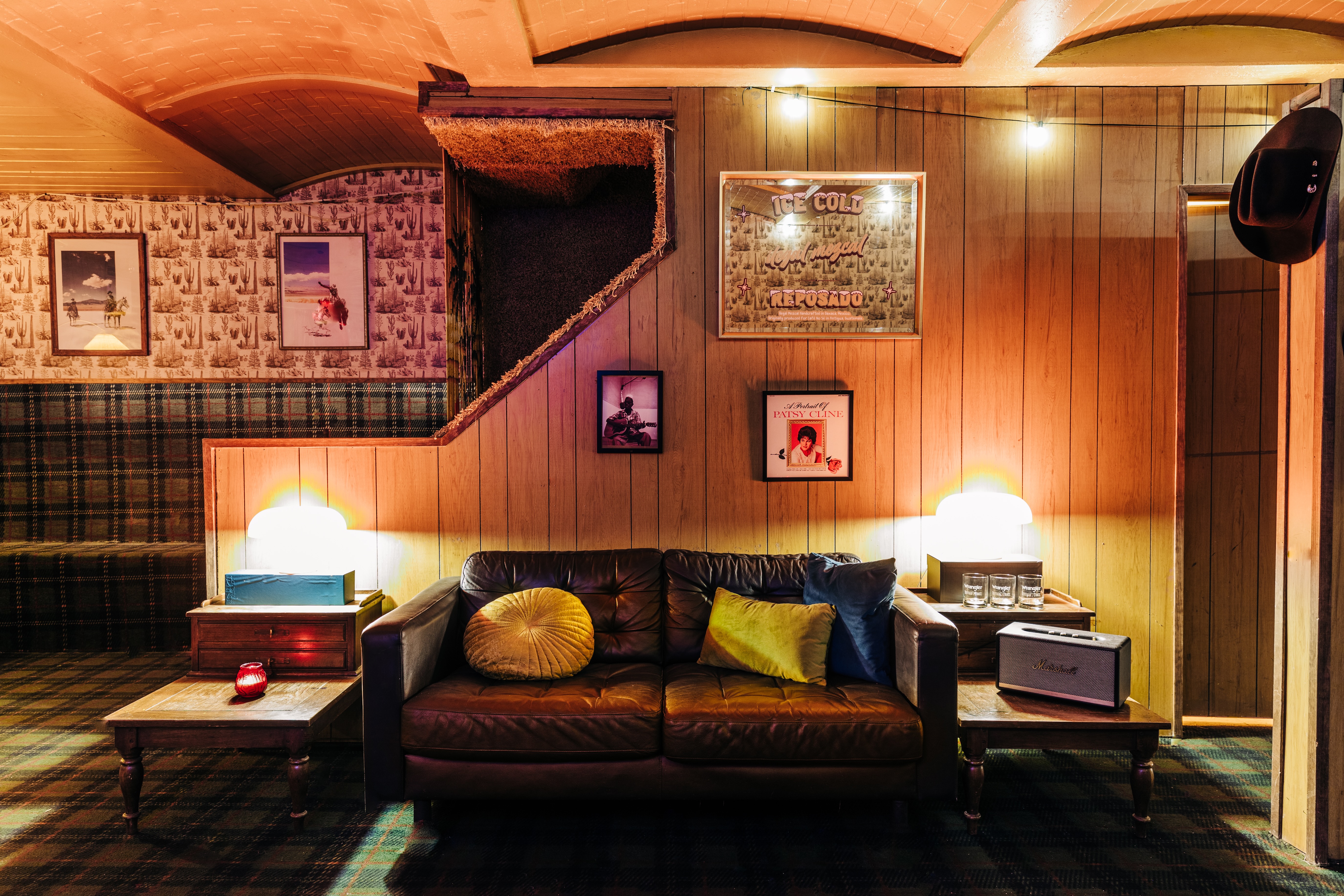 a living room filled with furniture and a fireplace