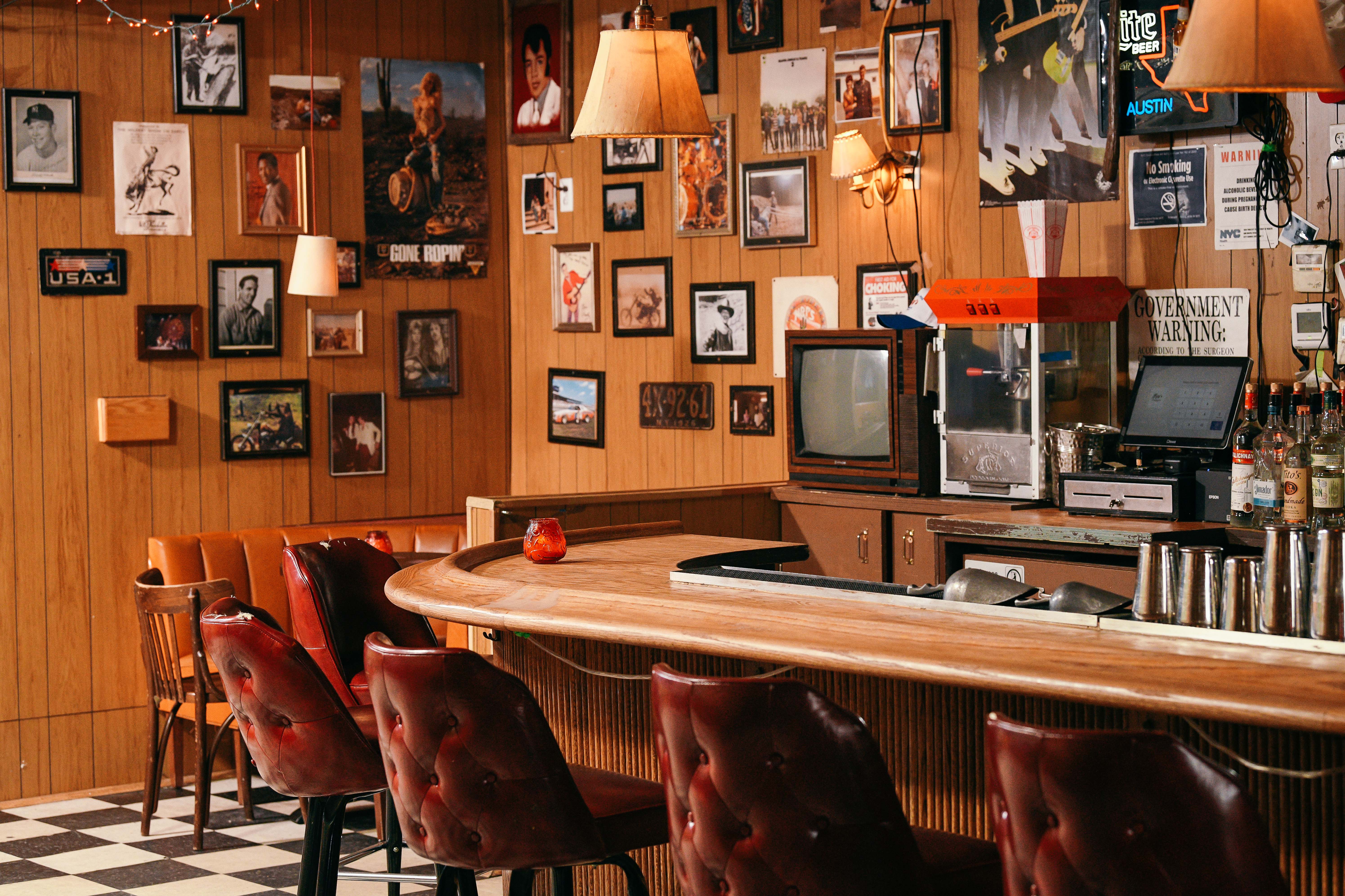 a room filled with furniture and a table in a restaurant