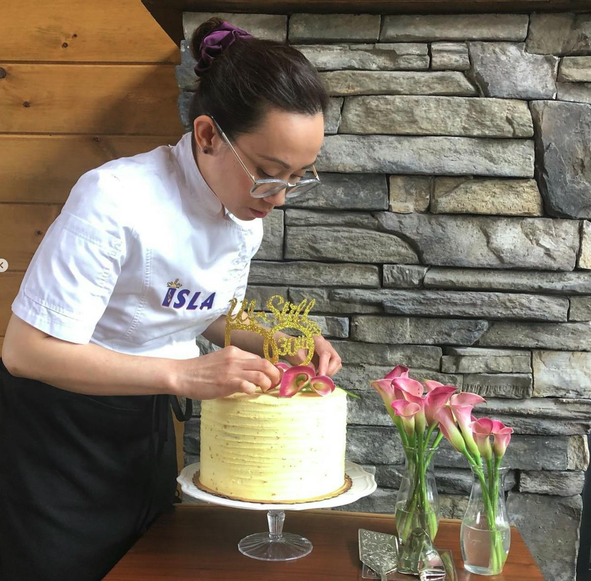 a man cutting food on a table