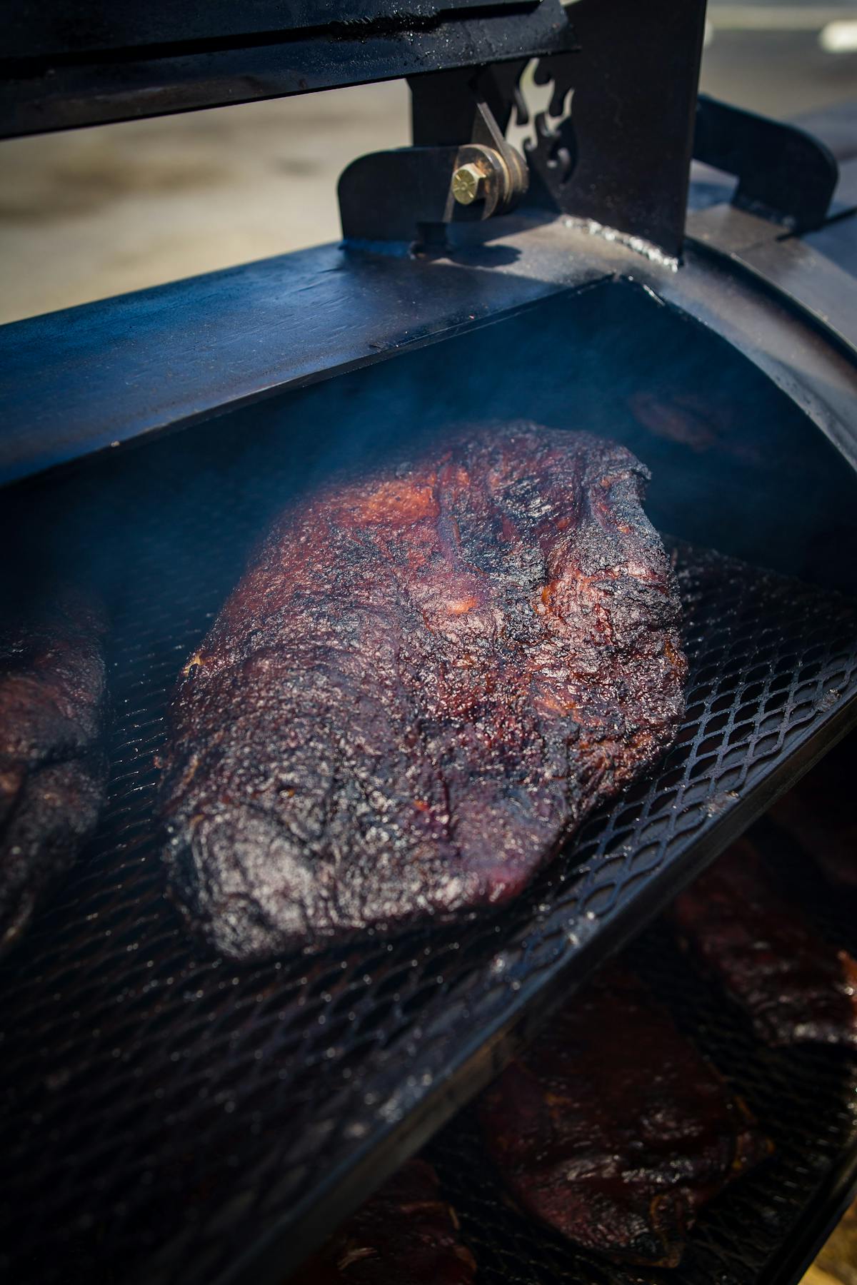 a close up of a piece of meat on a grill