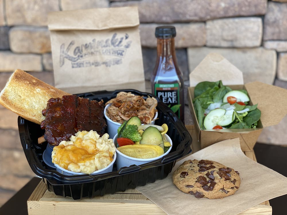 a plate of food on a picnic table