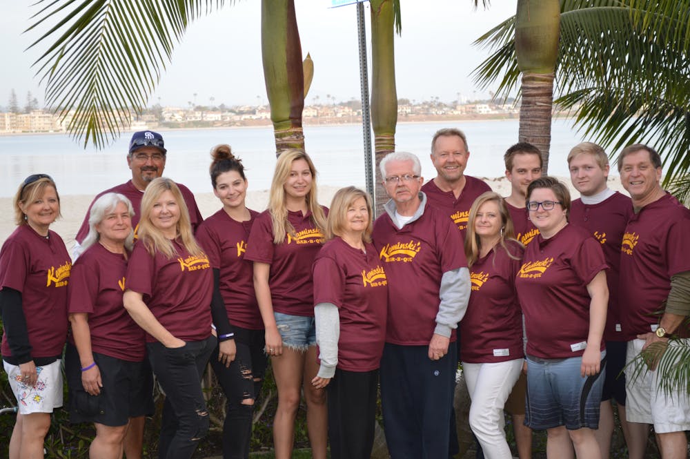 a group of people posing for a photo