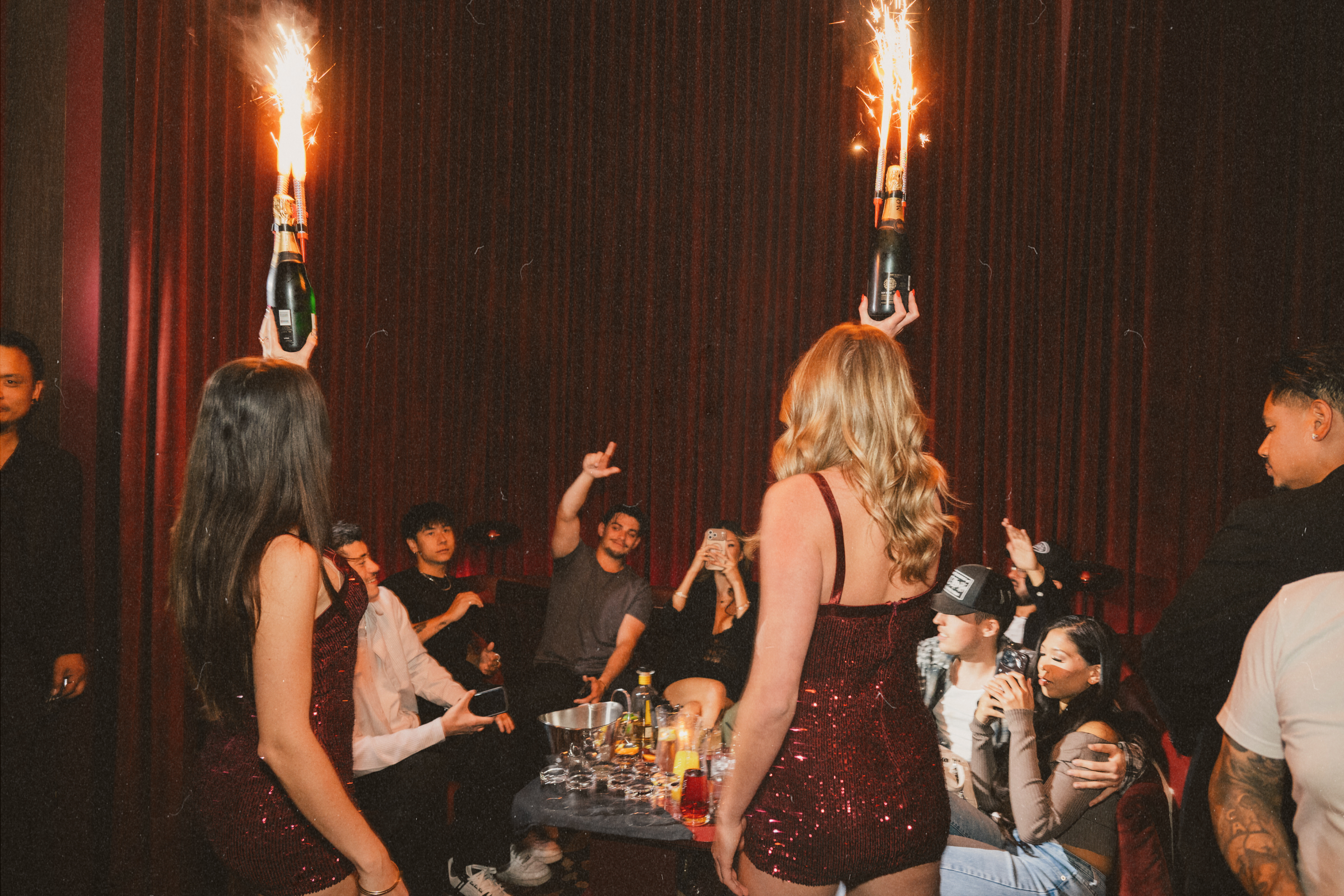 VIP bottle service presentation with sparklers at Wax Rabbit, a luxury Las Vegas speakeasy and cocktail lounge inside Durango Casino.