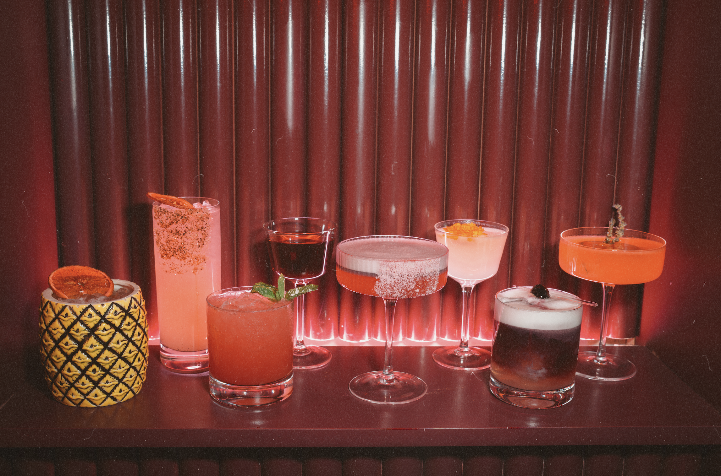 Signature cocktails displayed at Wax Rabbit, a Las Vegas tequila bar and hidden speakeasy serving handcrafted drinks in an upscale lounge setting.