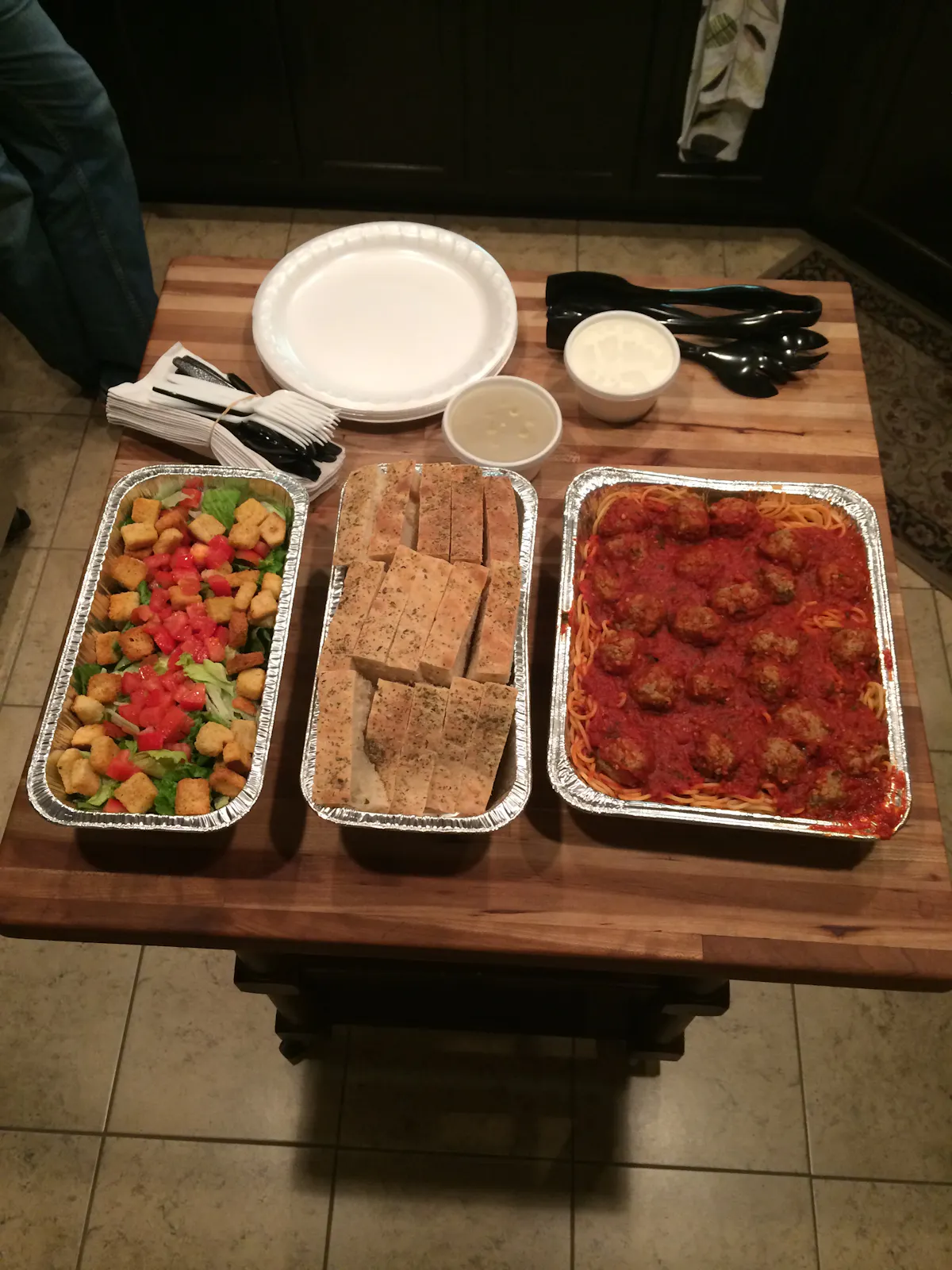 an array of several trays of food lined up