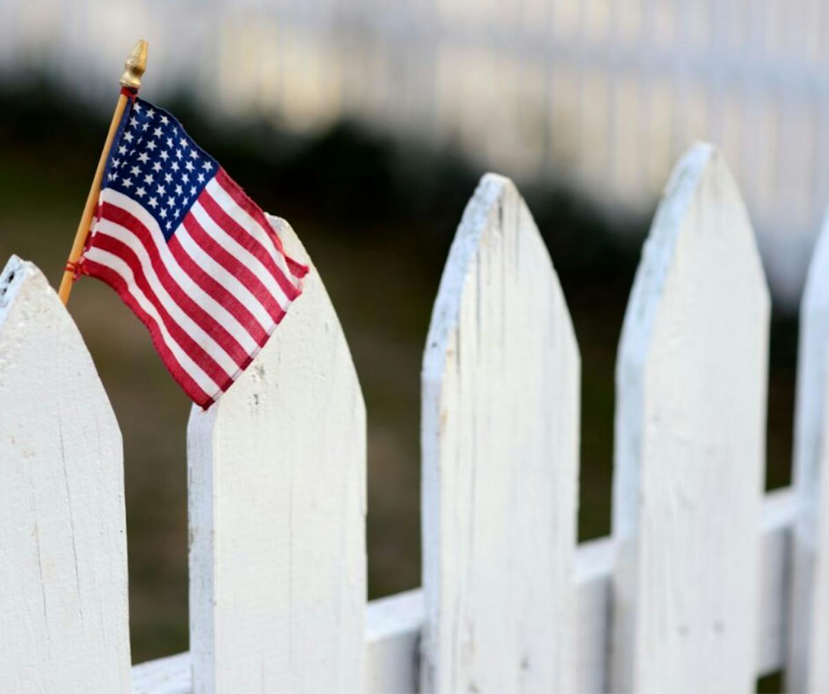 a row of wooden fence