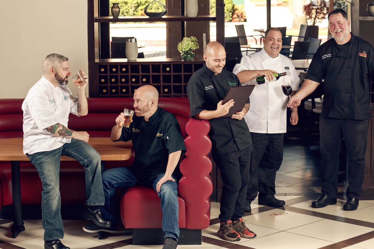 a group of people standing in a room