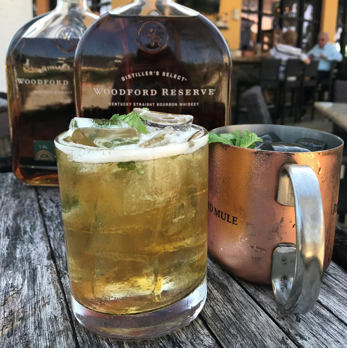 a glass of beer on a table