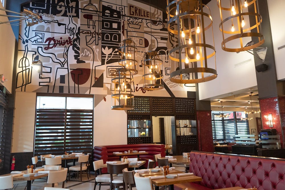 a room with a couch and table in a restaurant