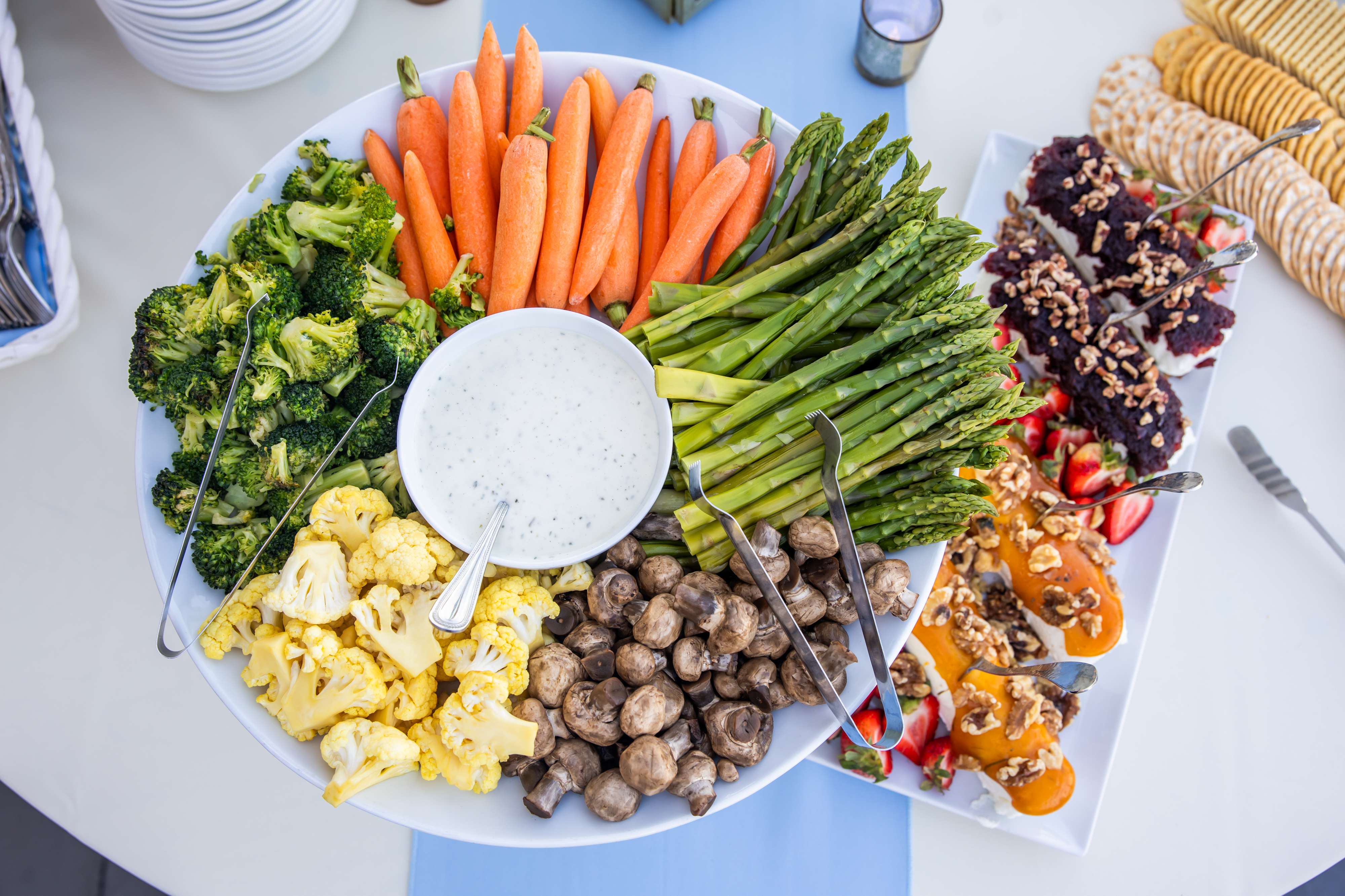 a plate of vegetables and dip