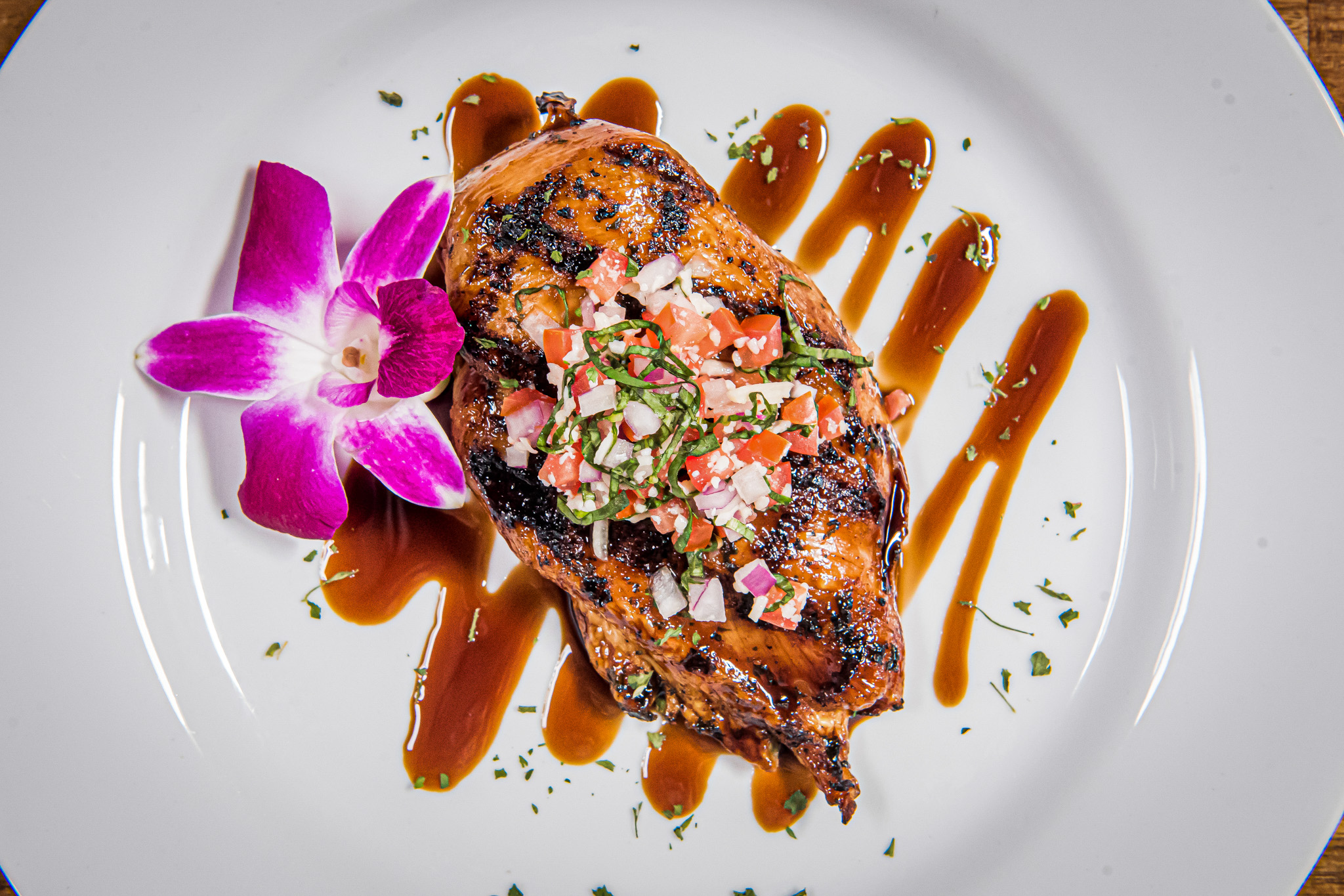 a plate of food with a flower