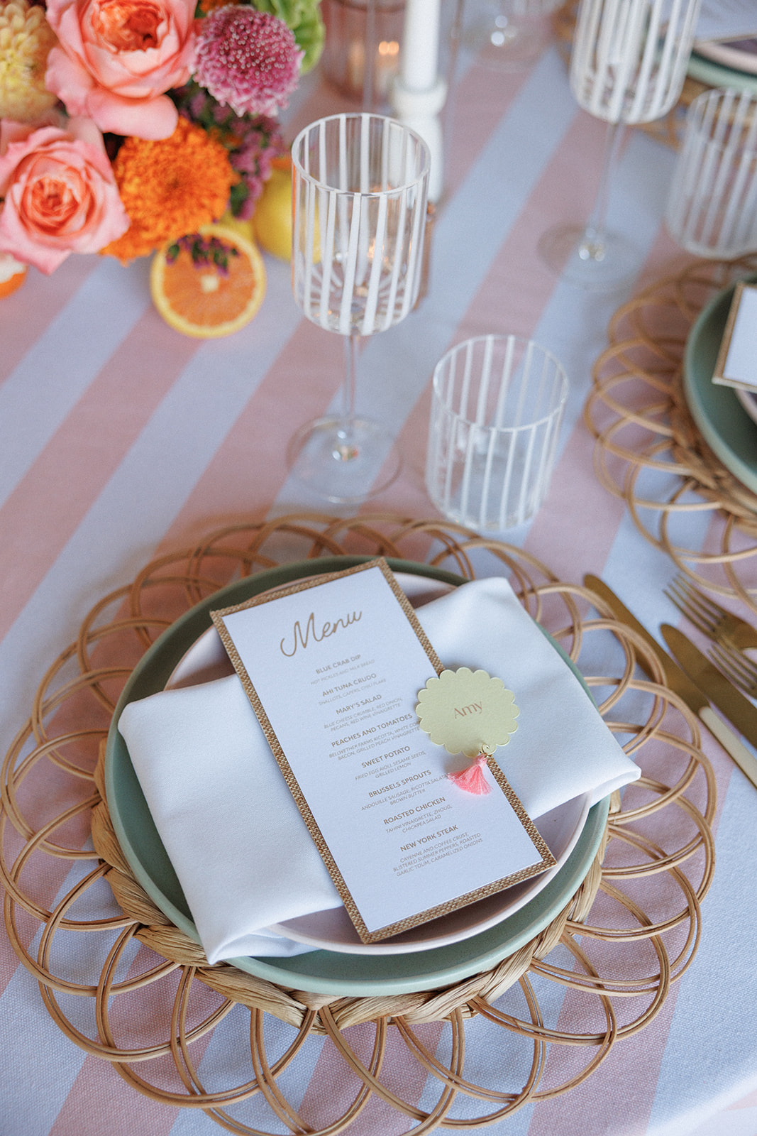 a table set with plates and glasses
