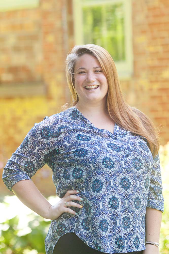 a woman smilling for the camera