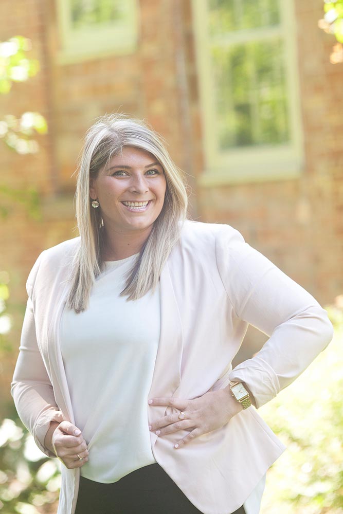 a woman smilling for the camera