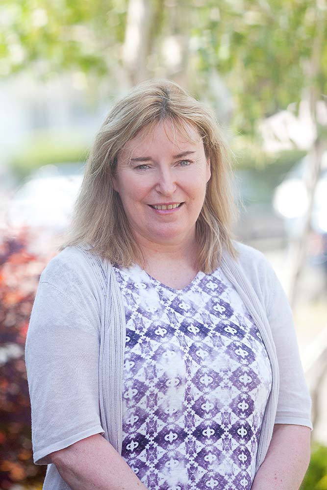 a woman smilling for the camera