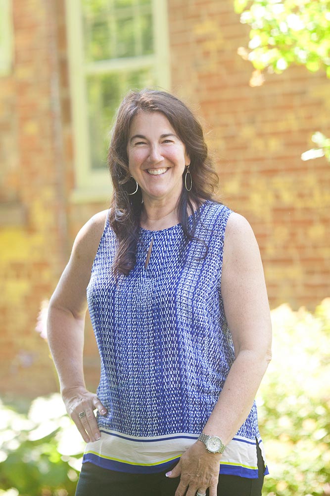 a woman smilling for the camera