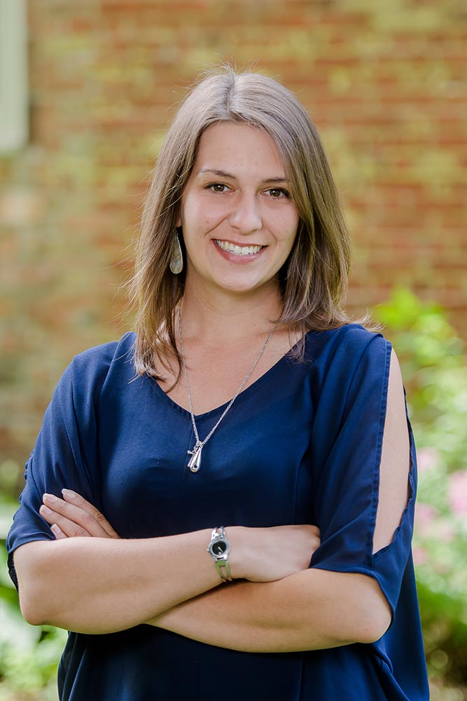 a woman smilling for the camera