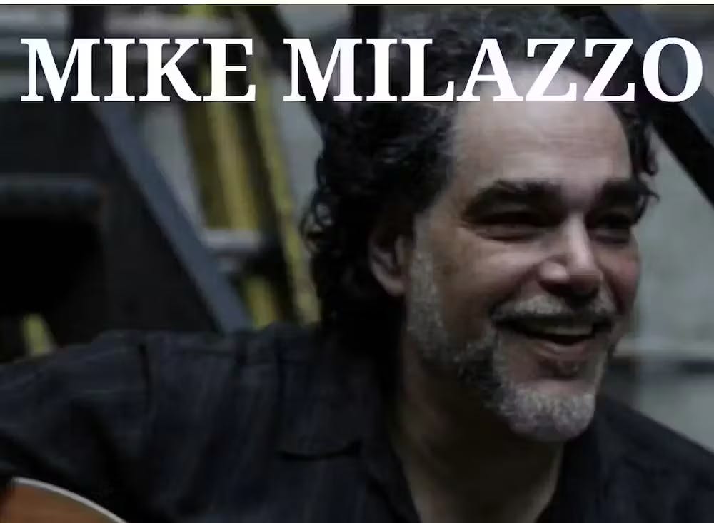 a man smiling for the camera