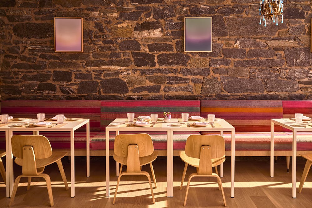 a chair sitting in front of a table