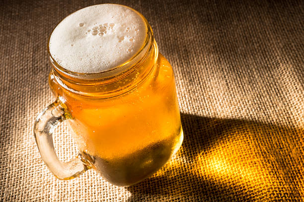 a close up of a glass of orange juice