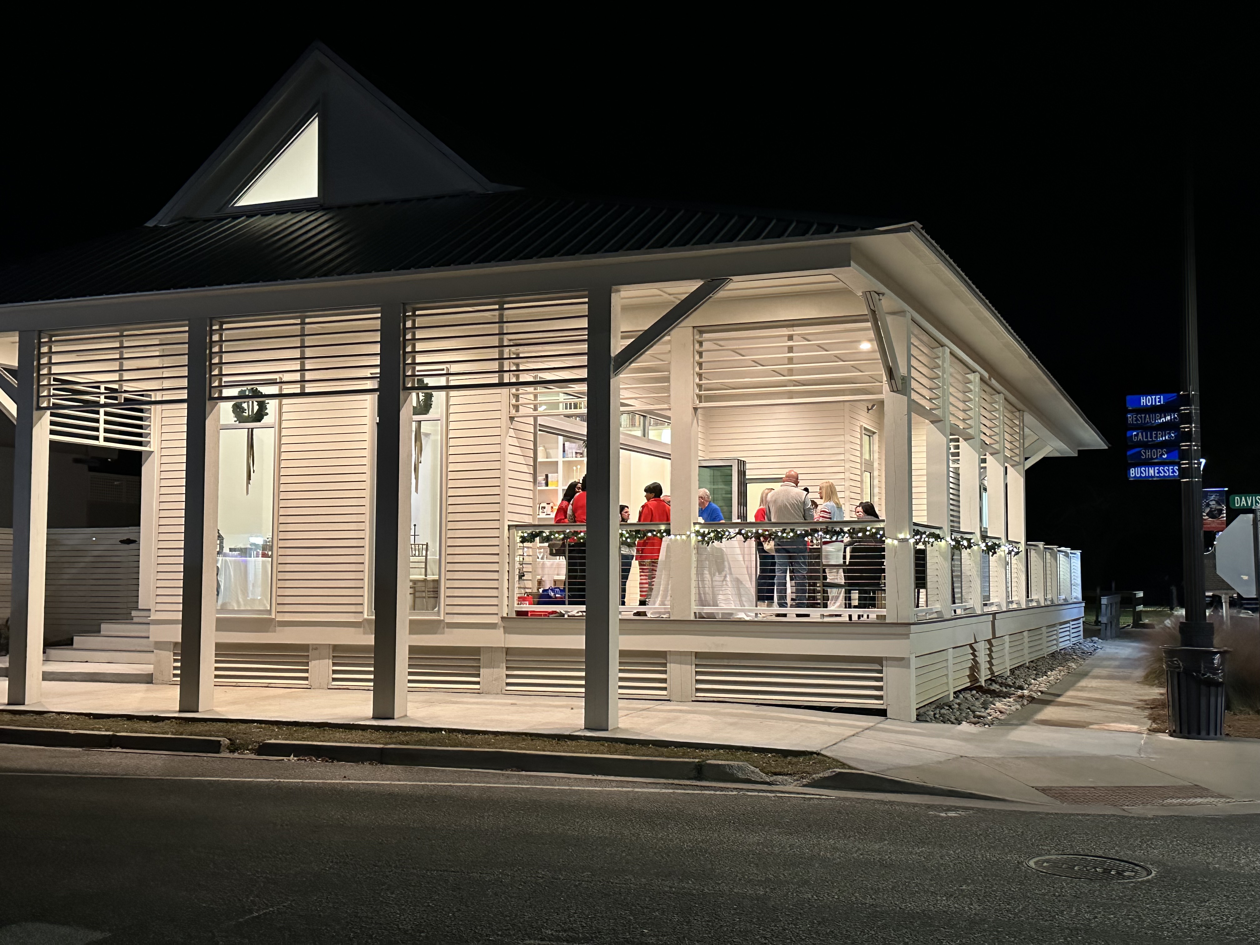an empty road with a building in the background
