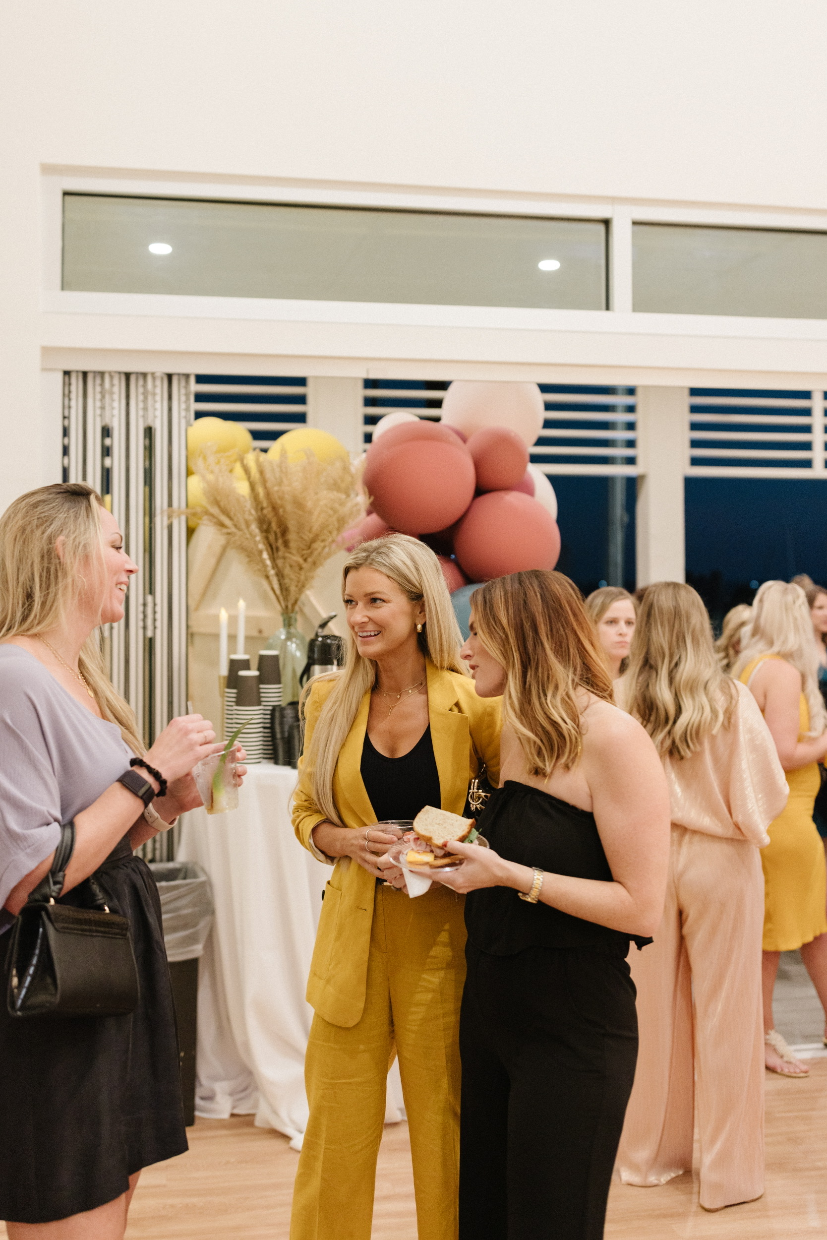 a group of people standing in a room