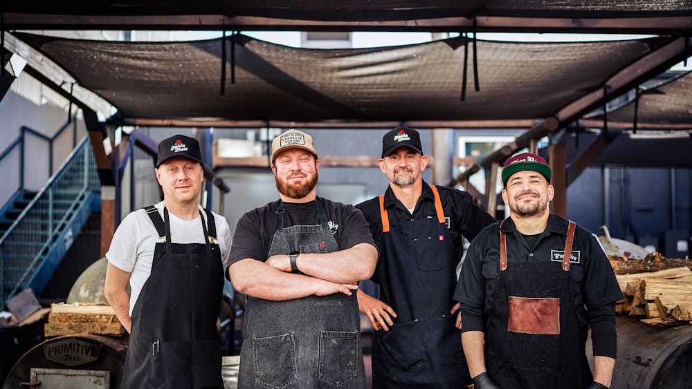 Pica Rica BBQ team standing in pit area