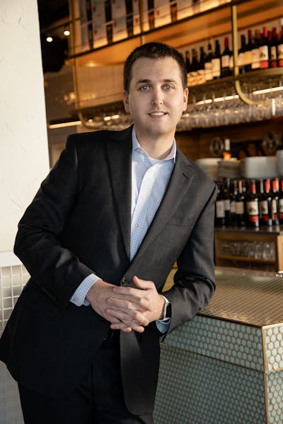 a man wearing a suit and tie