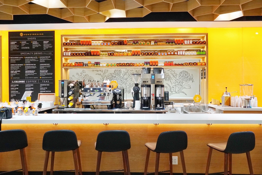 a desk with a computer on a table