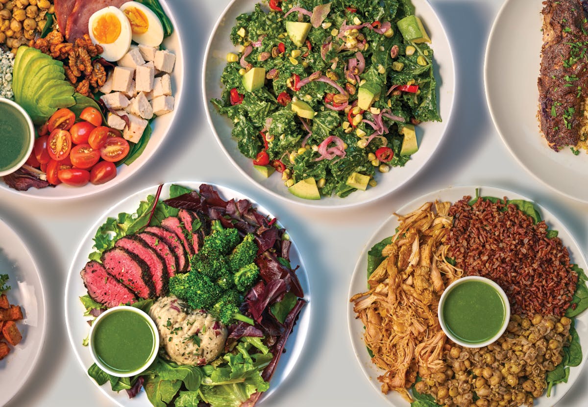 a bowl filled with different types of food on a plate