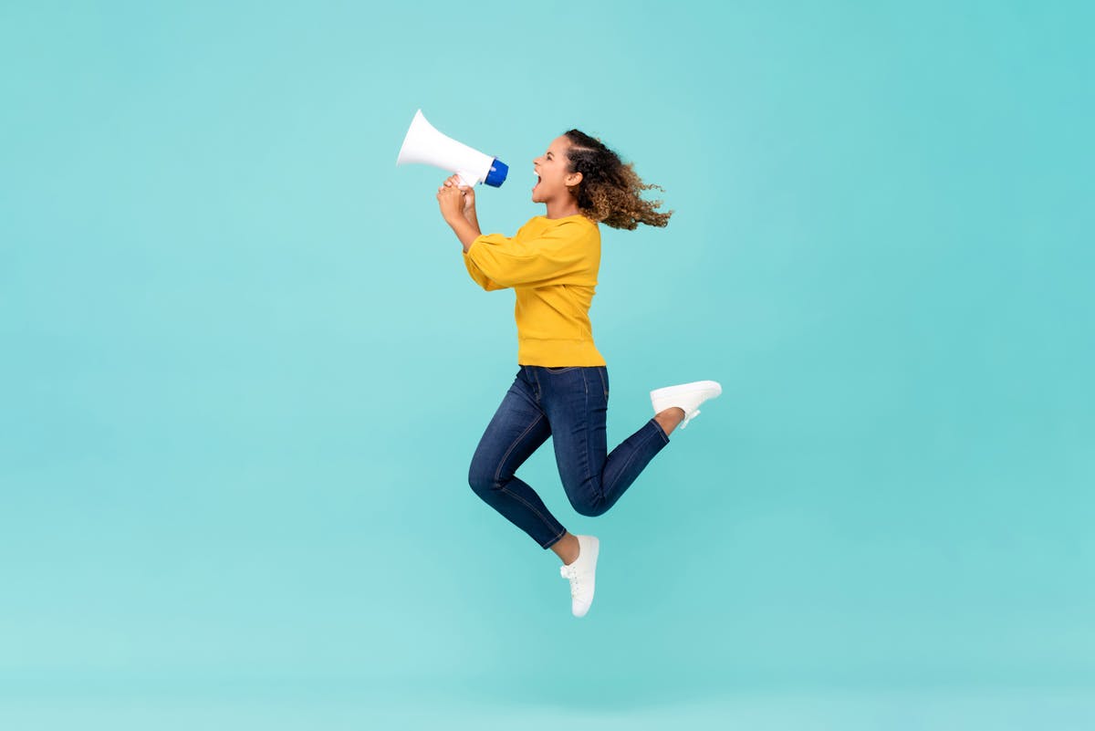 a woman jumping in the air
