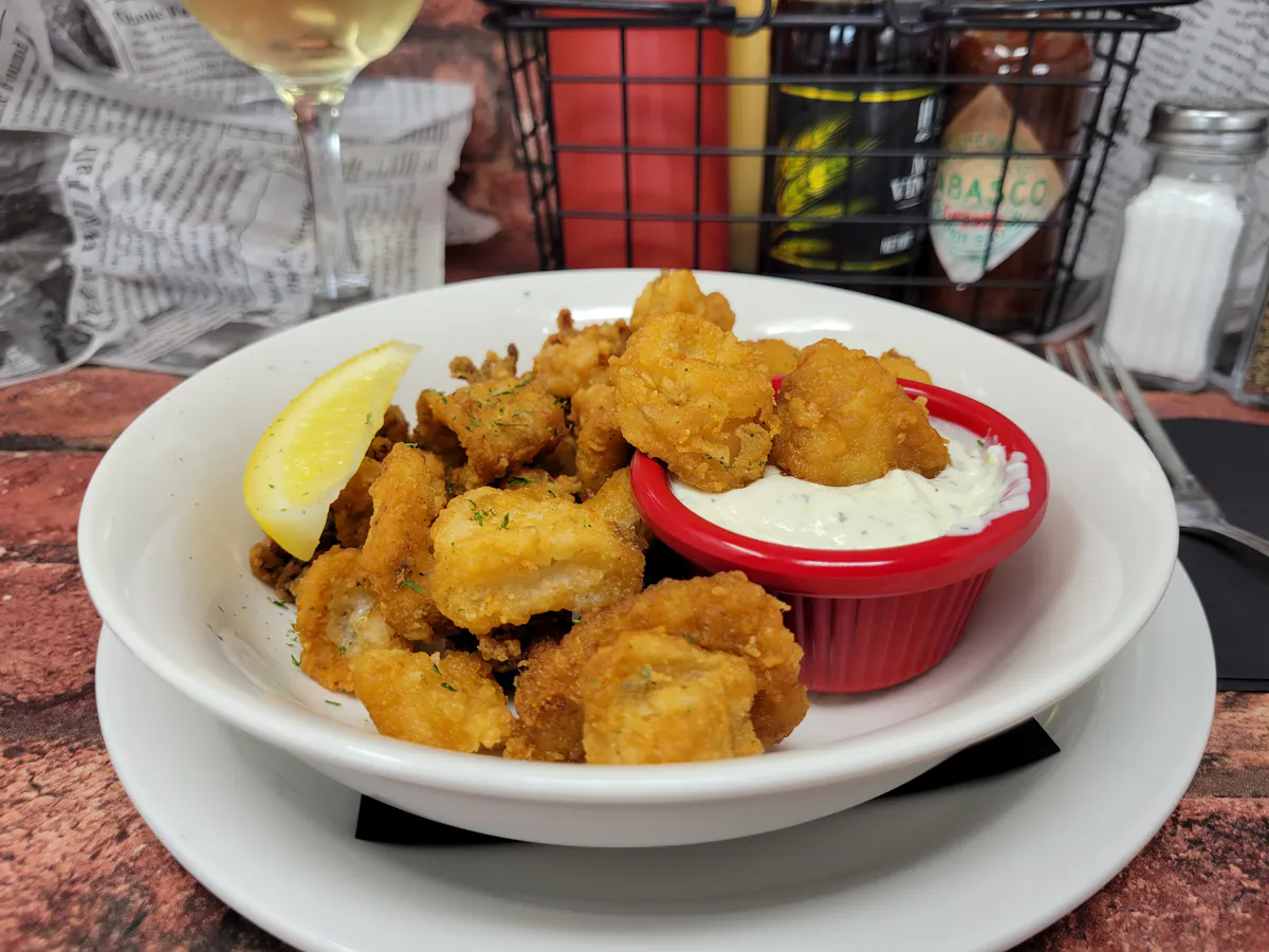 a plate full of food sitting on a table