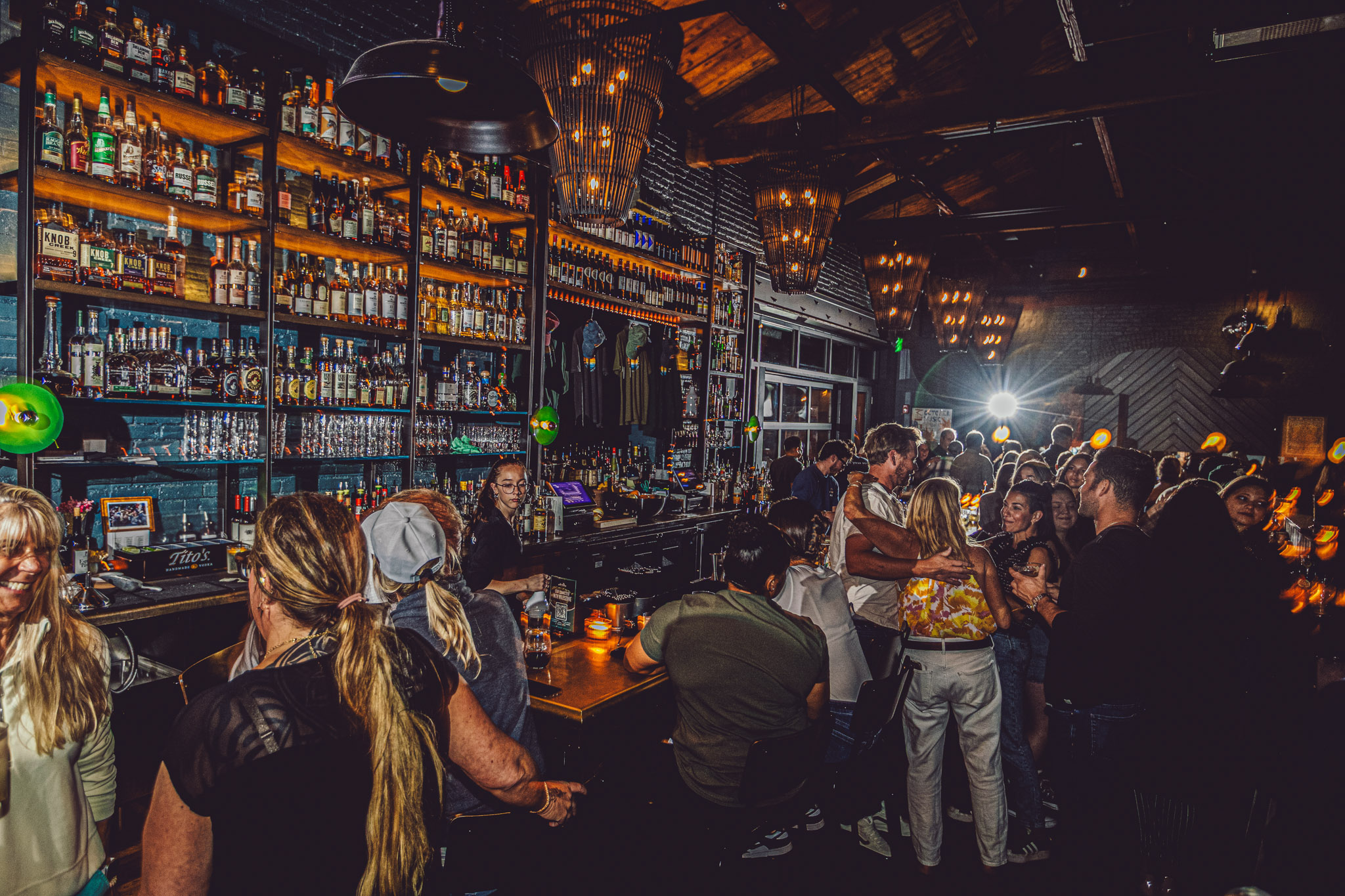 a group of people standing in front of a store