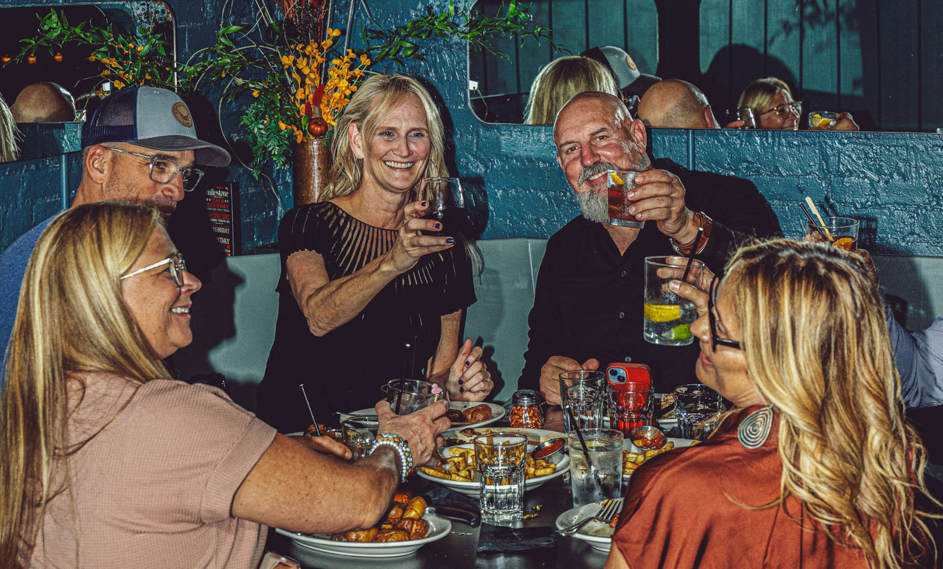 People enjoying fun and food and drink cheers