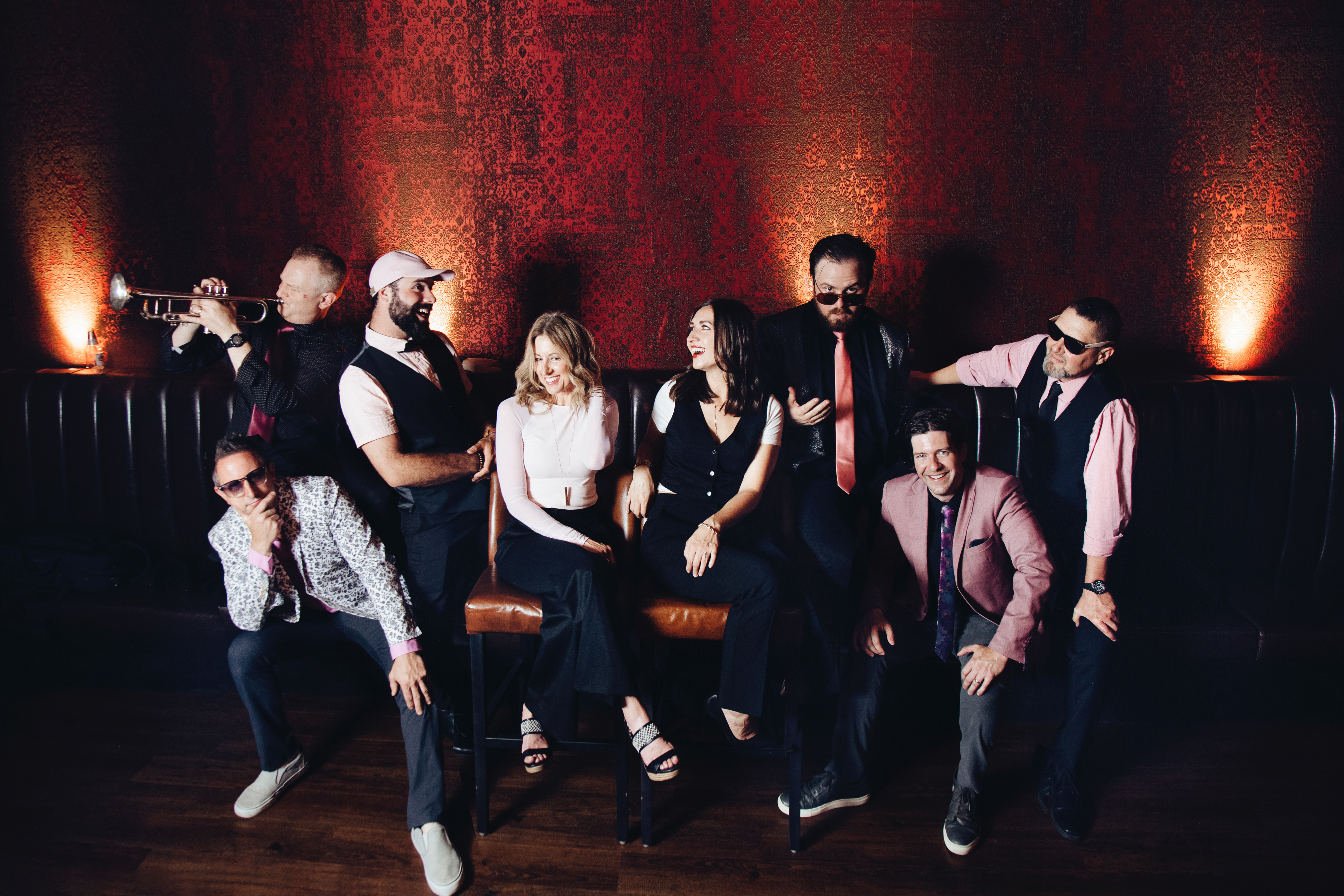 a group of people posing for the camera