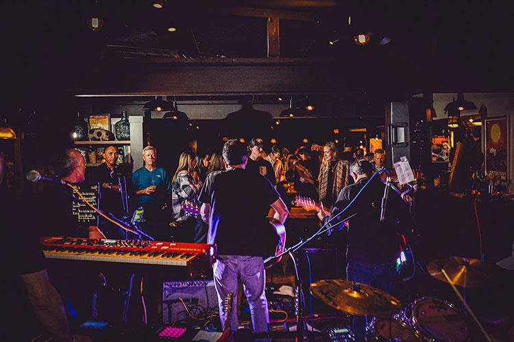 a group of people playing instruments