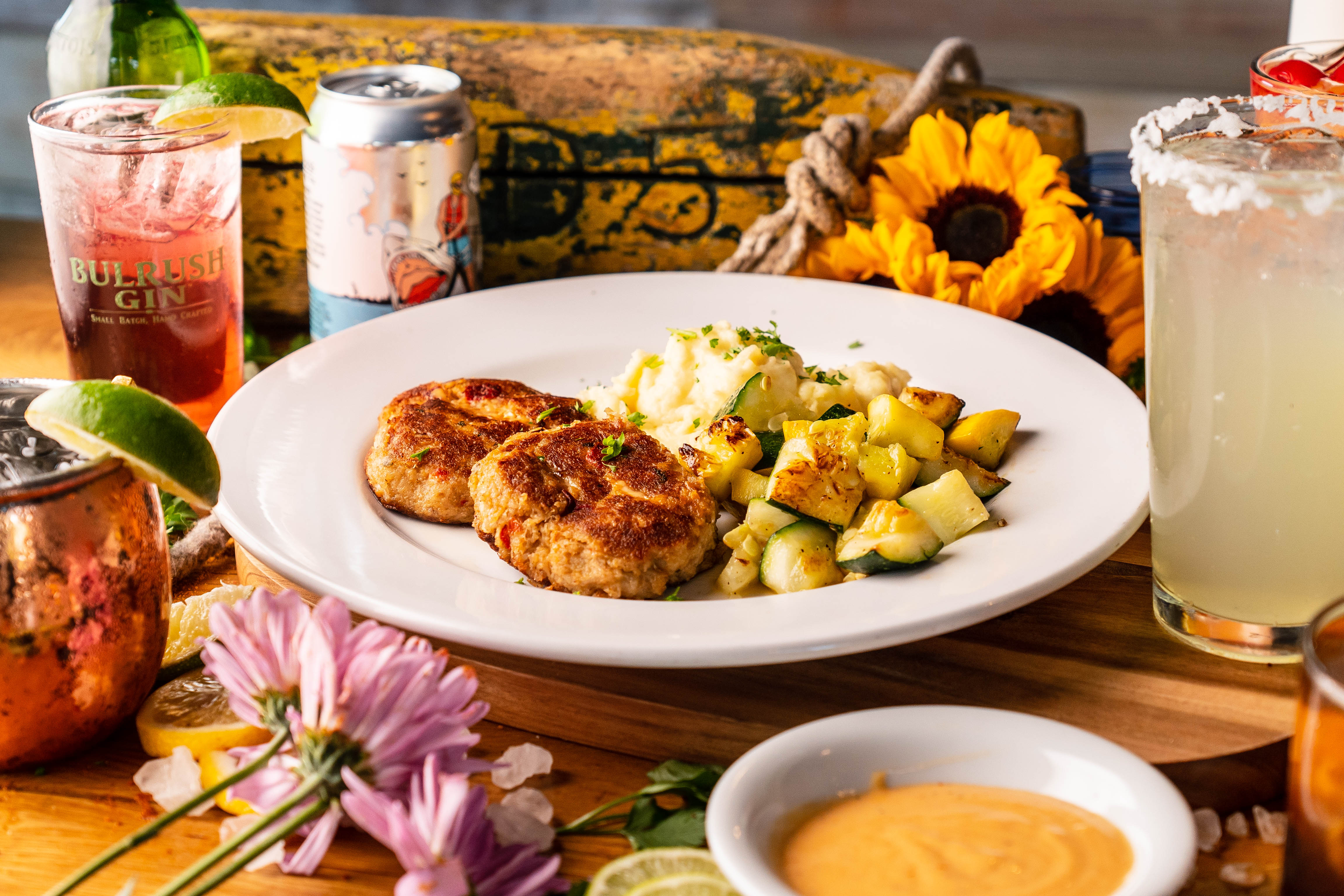 a plate full of food sitting on a table