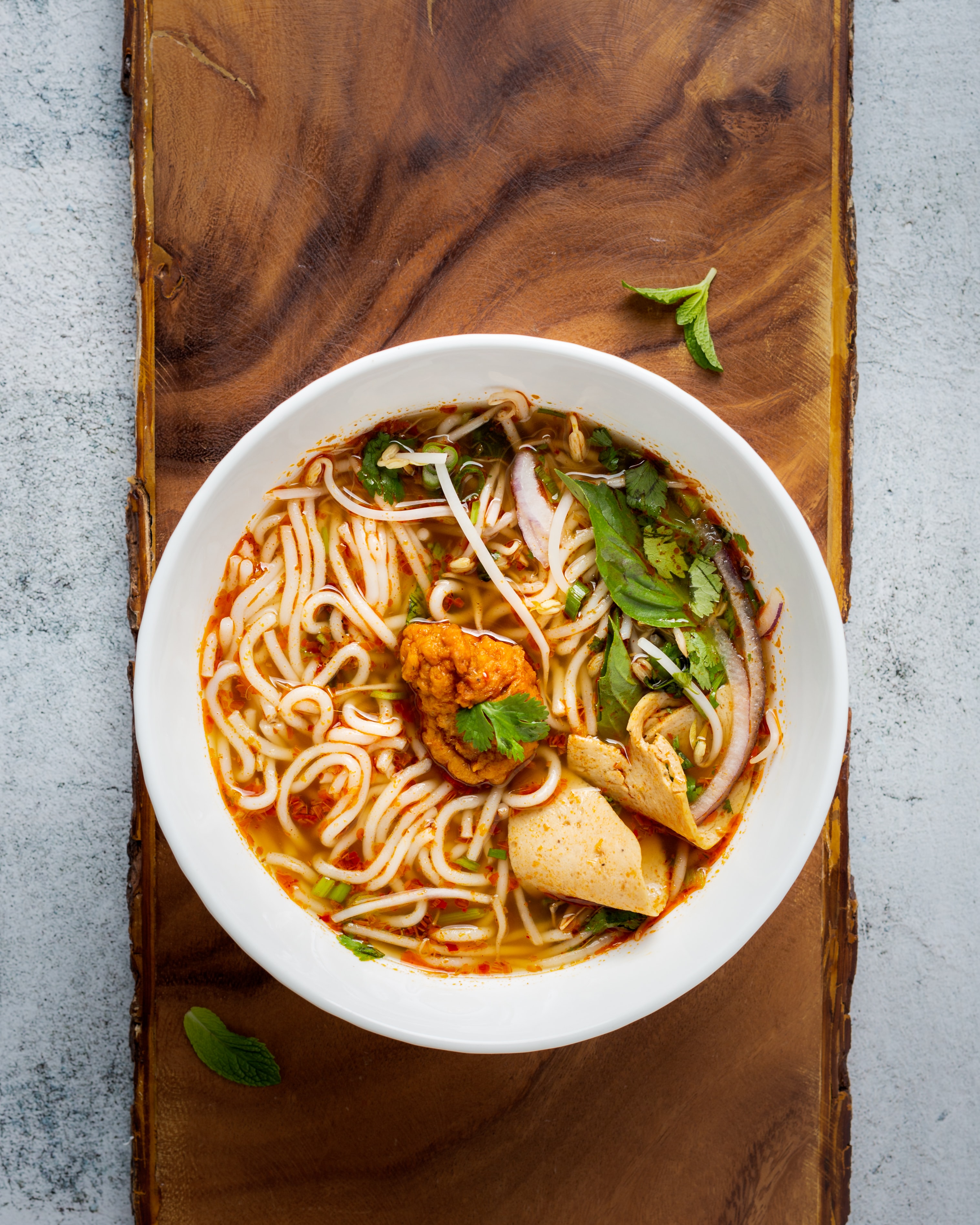 a bowl of food sitting on a table