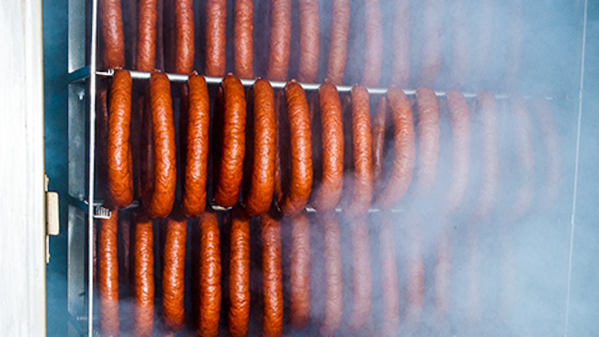 a hot dog on a grill