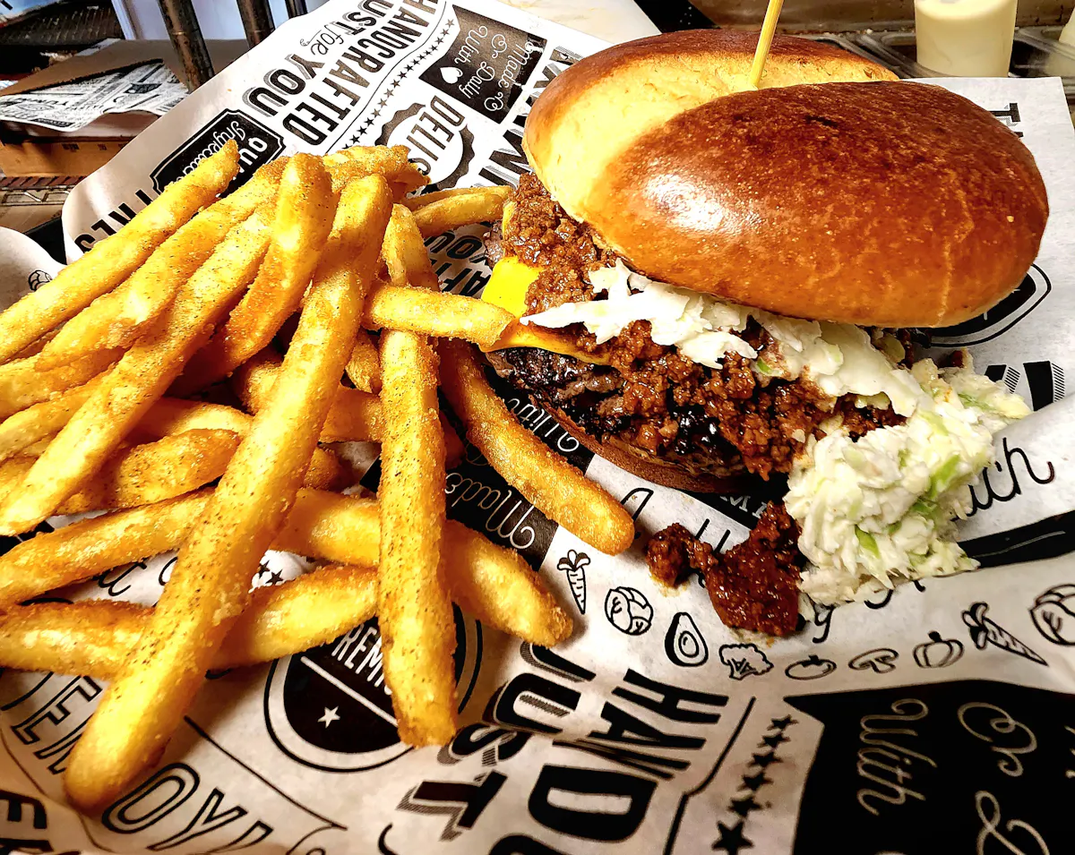a sandwich and fries on a plate
