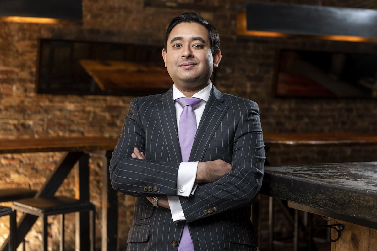 a man wearing a suit and tie