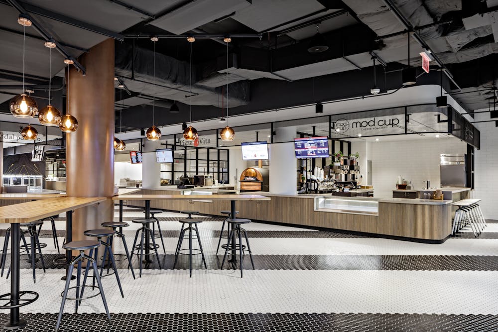 a kitchen with a table in a restaurant