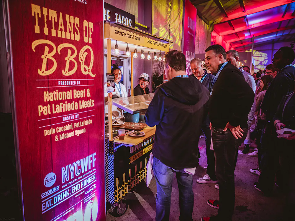 a group of people standing in front of a store