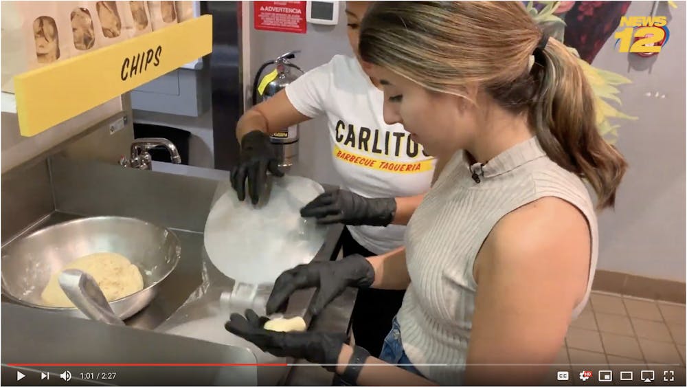 a person preparing food in a kitchen